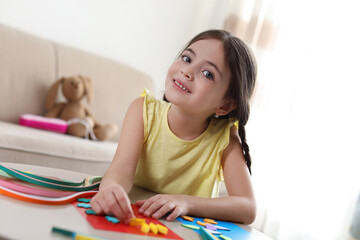 Poster - Little girl quilling at table indoors. Creative hobby