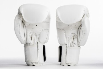 Wall Mural - White boxing gloves isolated on the white background