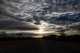 Fototapeta Na sufit - dramatic sunset on a remote highway, Western Australia