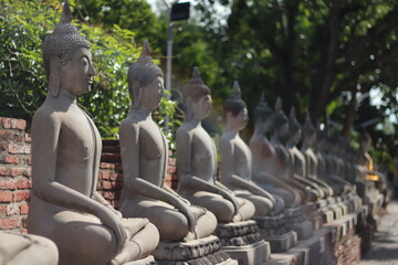 a traditional Thai art, Thai ancient face Buddha statue, with sacredness Thai respect, Worship, ask for blessings, admire, believe, more than 200 years old but in perfect condition.