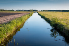The Netherlands A Wet Country Full Of Ditches And Canals, Sailing Boats And Vast Plains With Grassland, Photos Taken In Friesland Gaasterland Region