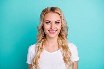 Poster - Portrait of pretty toothy smile satisfied candid woman look in camera enjoy rest relax wear casual style clothes isolated over green teal color background