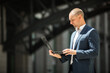 © Alexandr - handsome young man in suit with laptop