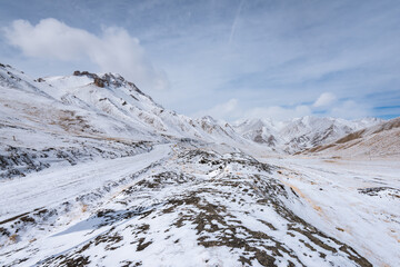 Wall Mural - the gravel road on the snow mountain