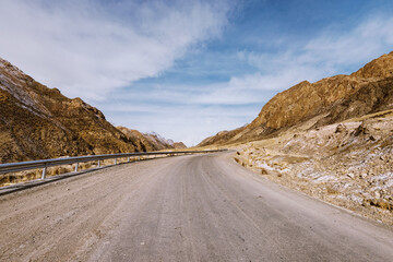 Wall Mural - the gravel road on the snow mountain