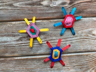 Wall Mural - Three turtles, teaching children's master class how to make turtles from yarn.