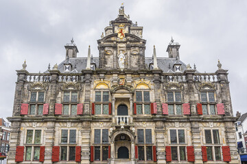 A view of the City Hall (1618 - 1620) of Delft, Netherlands. The City Hall in Delft is a Renaissance style building on the Market across from the Nieuwe Kerk.