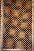 Rusty Metal Lattice Or Grille On Window Of Old Building. Texture Or Abstract Background.