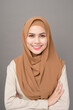© tonefotografia - Portrait of beautiful woman with hijab is smiling on gray background