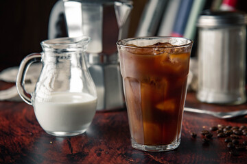 Sticker - iced coffe with milk and book cafe background