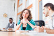 © Katie Huisman/KOTO - Business people talking in office