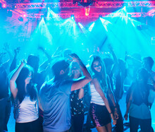 People Dancing On Dance Floor Of Nightclub
