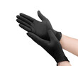 Two black surgical medical gloves isolated on white background with hands. Rubber glove manufacturing, human hand is wearing a latex glove. Doctor or nurse putting on nitrile protective gloves