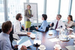 © Chris Ryan/KOTO - Businesswoman talking in meeting
