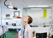 © Paul Bradbury/KOTO - Businessman examining security camera in office