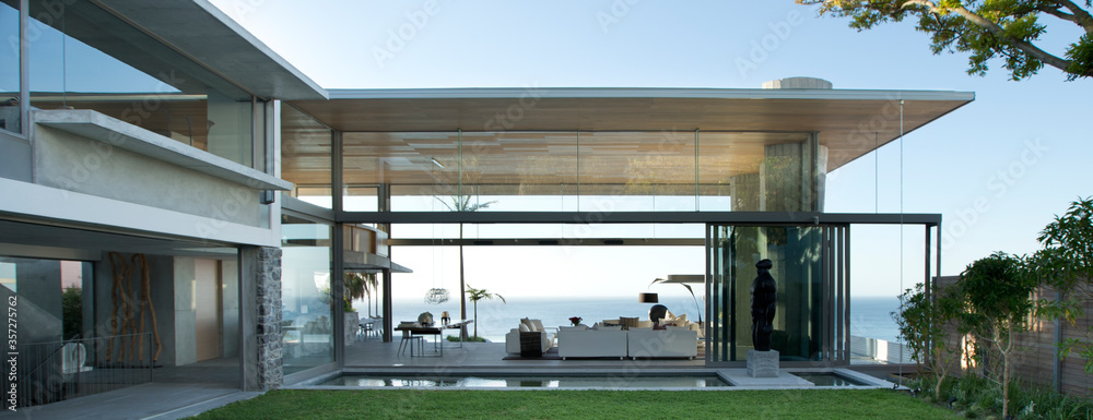 Patio and swimming pool of modern house - obrazy, fototapety, plakaty 