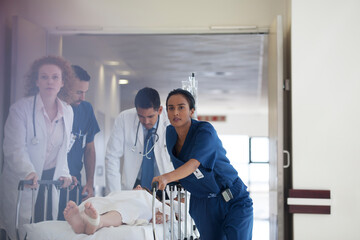 Wall Mural - Hospital staff rushing patient to operating room