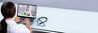 © Andrey Popov - Doctor Video Conferencing With Female Colleague On Laptop