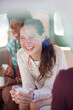 © Sam Edwards/KOTO - Women drinking coffee in back seat of van
