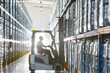 © Martin Barraud/KOTO - Worker operating forklift in warehouse