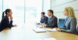 © Robert Daly/KOTO - Business people talking in meeting
