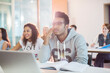 © Tom Merton/KOTO - University students sitting in classroom