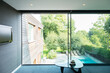 © Astronaut Images/KOTO - Modern house overlooking swimming pool