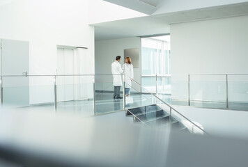 Doctors talking in hospital corridor