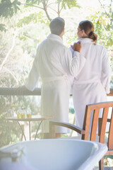 Wall Mural - Couple relaxing together in spa