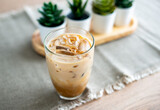 Iced coffee is easy to prepare at home. Iced coffee latte at home. Iced espresso with fresh milk and iced cubes.