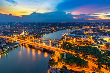 Beautiful of Bangkok cityscape areas Phra Buddha Yodfa Bridge with Chaopraya river the capital of Thailand