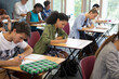 © David Schaffer/KOTO - University students taking exam in classroom