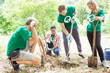 © Robert Daly/KOTO - Environmentalist volunteers planting new tree