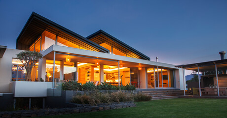 Illuminated luxury modern house at night