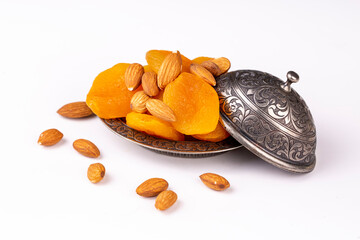 Wall Mural - Dried apricot and almond on the white background