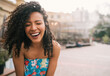 © Mego-studio - Portrait of confident woman laughing.