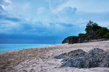 Wall Mural - Bali island landscape. Seascape with waves, azure water at beautiful hidden white sand. Bali sea beach nature, outdoor Indonesia. Bali island landscape. Summer holidays. Travel, vacation concept.