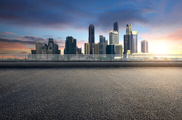 empty floor platform with sunset view modern city skyline background