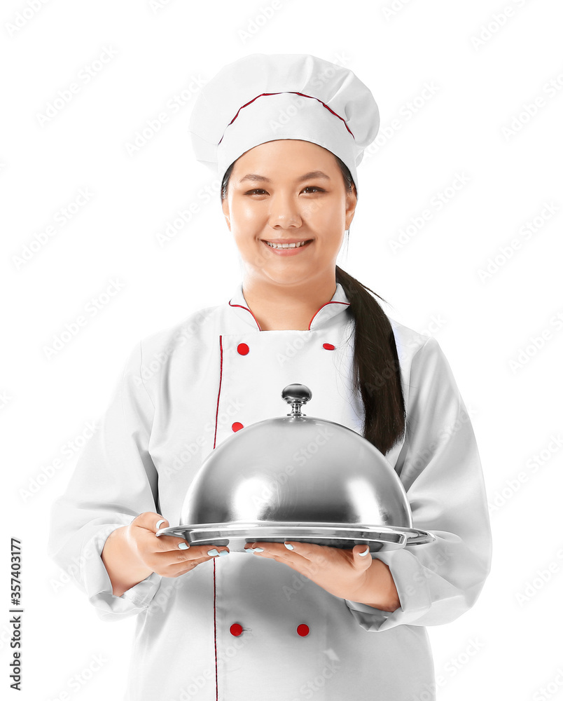 Beautiful Asian chef with tray on white background