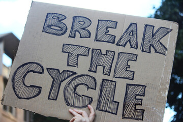 Sydney, NSW / Australia - June 6 2020: Black Lives Matter Protest March. Protesting Aboriginal deaths in custody and the death of. Sign reading 'Break the cycle'