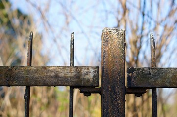 Poster - Closeup shot of a rusted old metal fence