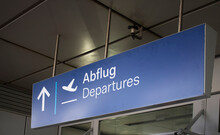 Close Up View Of Departures Sign At Airport.
