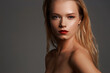 © Dmitry Tsvetkov - High fashion closeup beauty portrait of young stunning woman with long straight blonde hair, perfect makeup and red lips against gray background