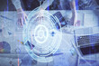© peshkova - Double exposure of man and woman working together and data theme hologram drawing. Computer background. Top View.