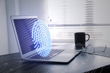 Fingerprint identification. Modern laptop on table indoors