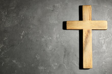 Wooden Christian Cross On Grey Stone Table, Top View With Space For Text. Religion Concept