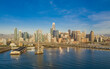 © Patrick - Aerial view of the San Francisco, California, skyline at sunrise. Ample copy space in blue sky. Bay bridge in foreground.