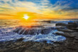 © Taras Vyshnya - Sea TB On rocks sun Overflow