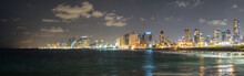 Panoramic View At Night. Seascape And Skyscrapers On Background In Tel Aviv, Israel.