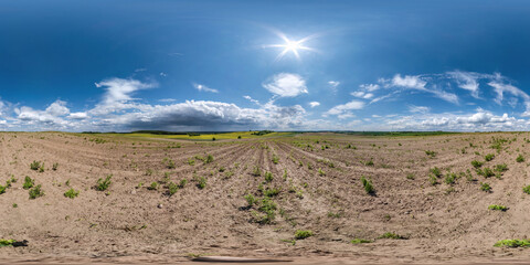 Wall Mural - full seamless spherical hdri panorama 360 degrees angle view among fields in spring day with awesome